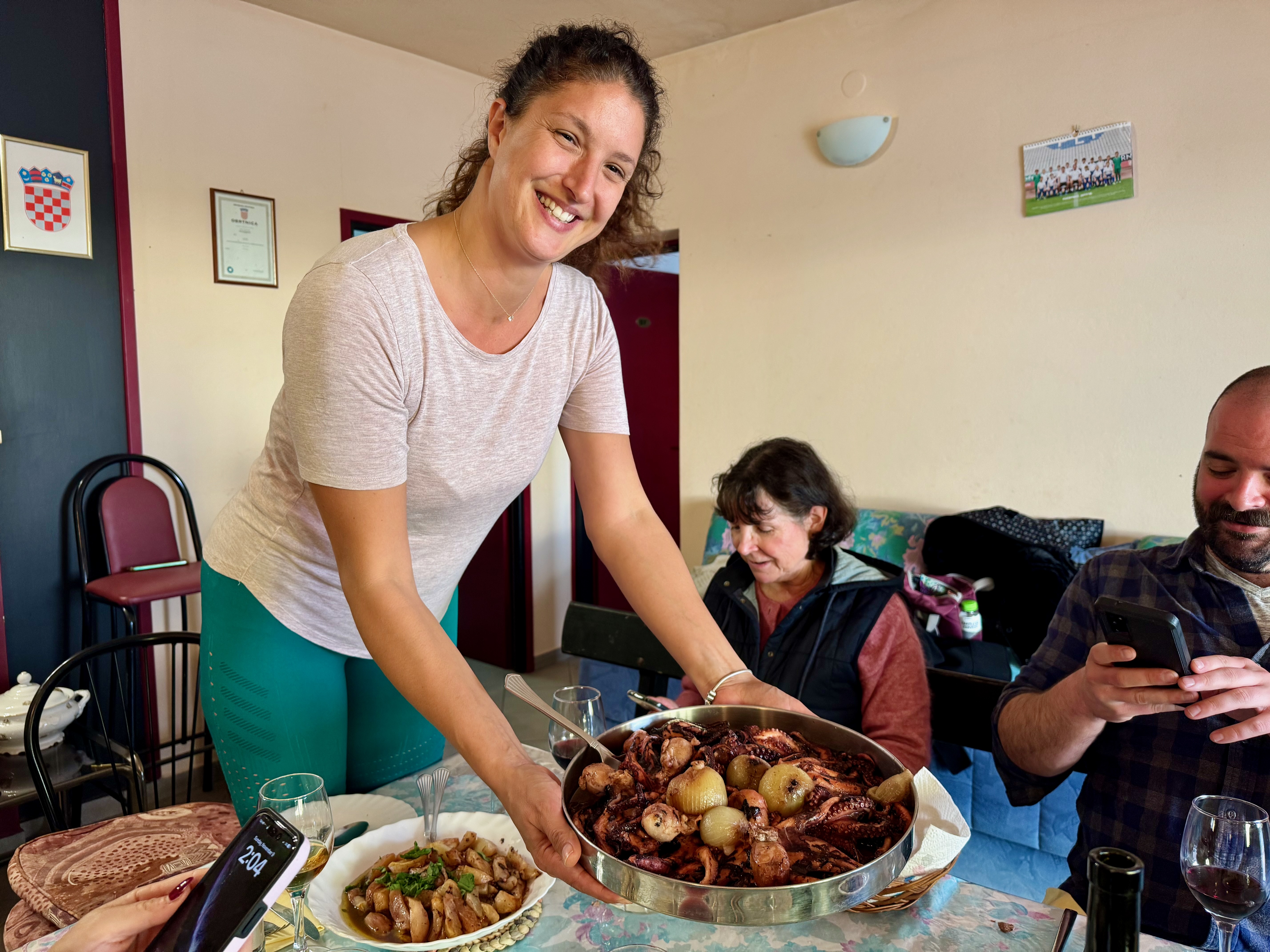 Maria bringing Octopus Peka